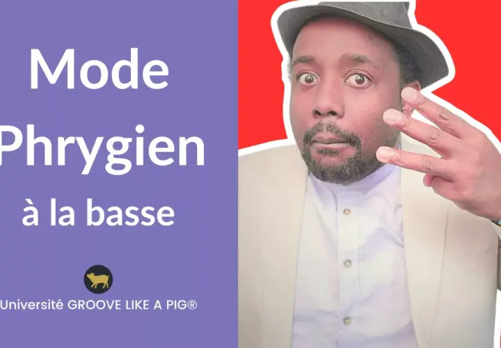 Un homme avec un chapeau et un blazer blanc explique le mode phrygien à la basse. Université Groove Like A Pig.