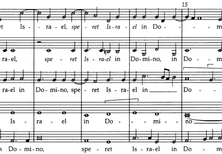 Extrait de partition musicale montrant un exemple de polyphonie vocale avec les paroles "Israel in Domino".