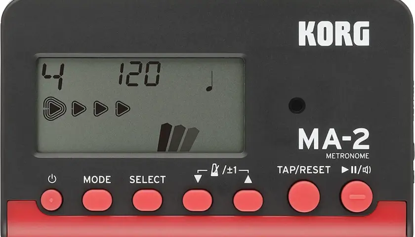 Appareil pour battre la mesure musique Korg MA-2, affichant 4/4 et 120 BPM. Idéal pour garder le rythme.