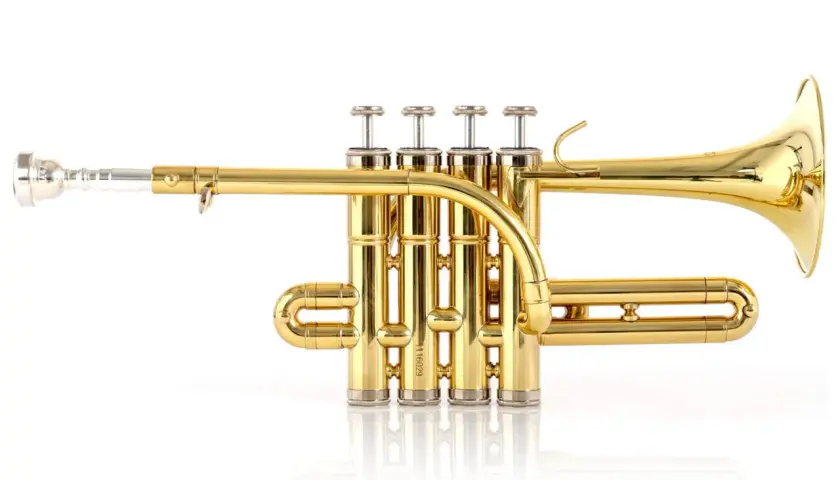 Une trompette en laiton brillant, prête à jouer une mélodie joyeuse. Ses pistons sont alignés, attendant le souffle du musicien.