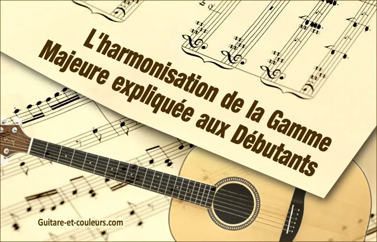 Une guitare repose sur des partitions de musique. Le texte "L'harmonisation de la Gamme Majeure expliquée aux Débutants" est visible.