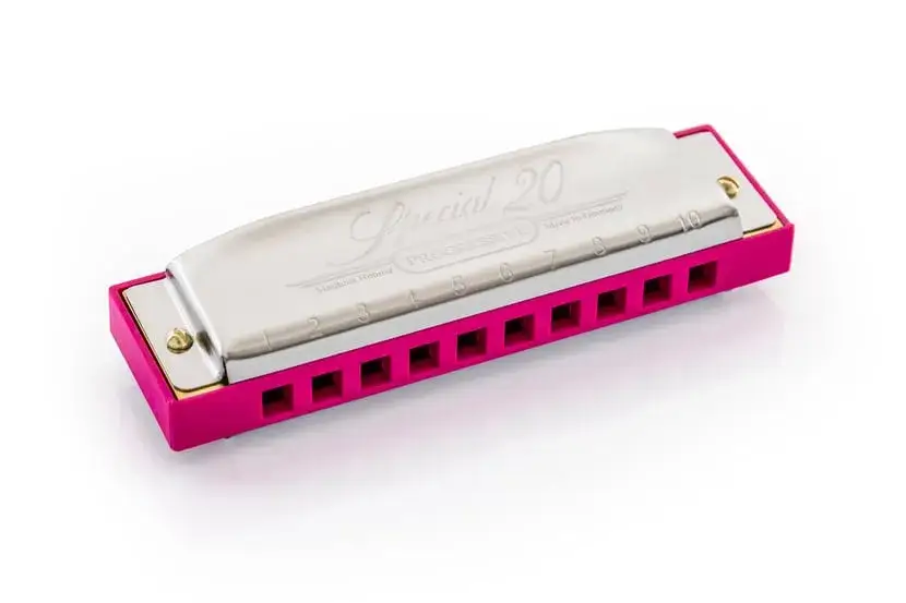 Harmonica de musique Special 20, rose vif, prête à jouer des mélodies blues.
