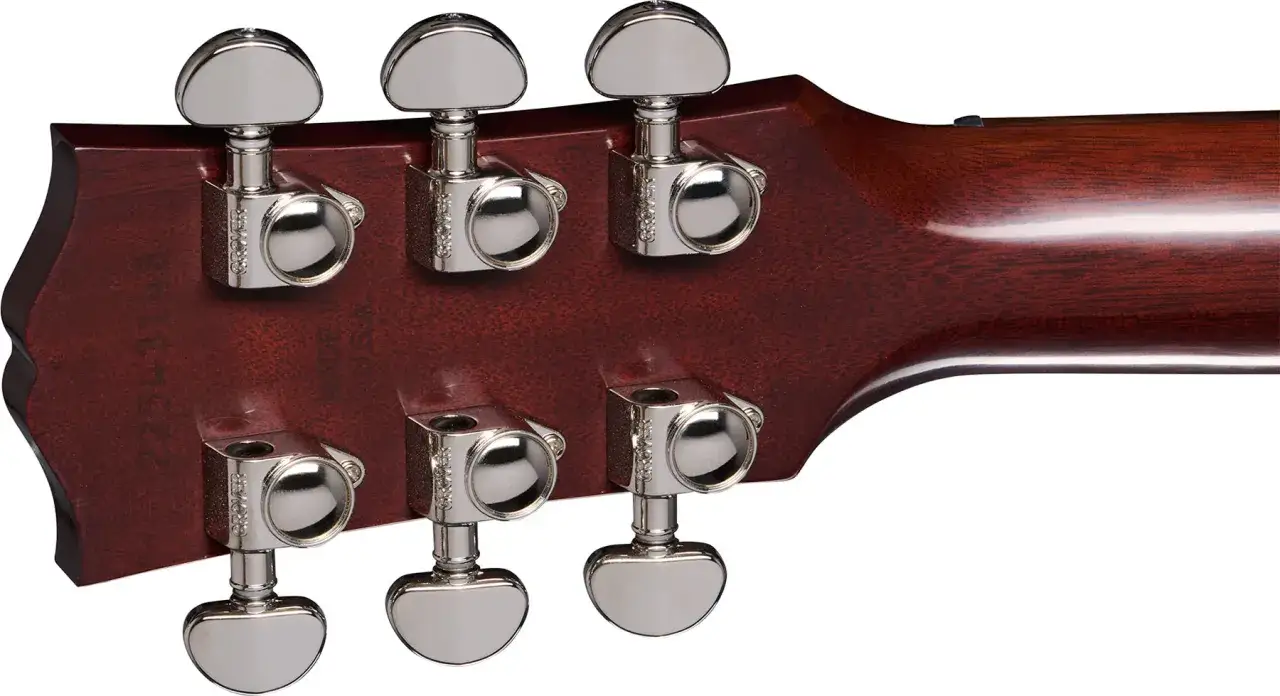 M&eacute;caniques chrom&eacute;es sur une t&ecirc;te de manche de guitare Gibson, pr&ecirc;tes &agrave; accorder.